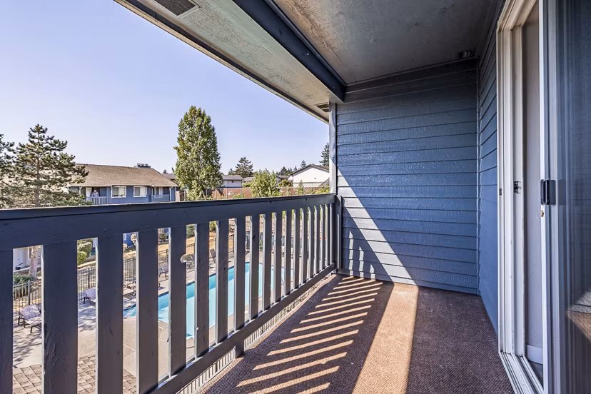 Private patio balcony with city views at 1202 Pearl Apartments