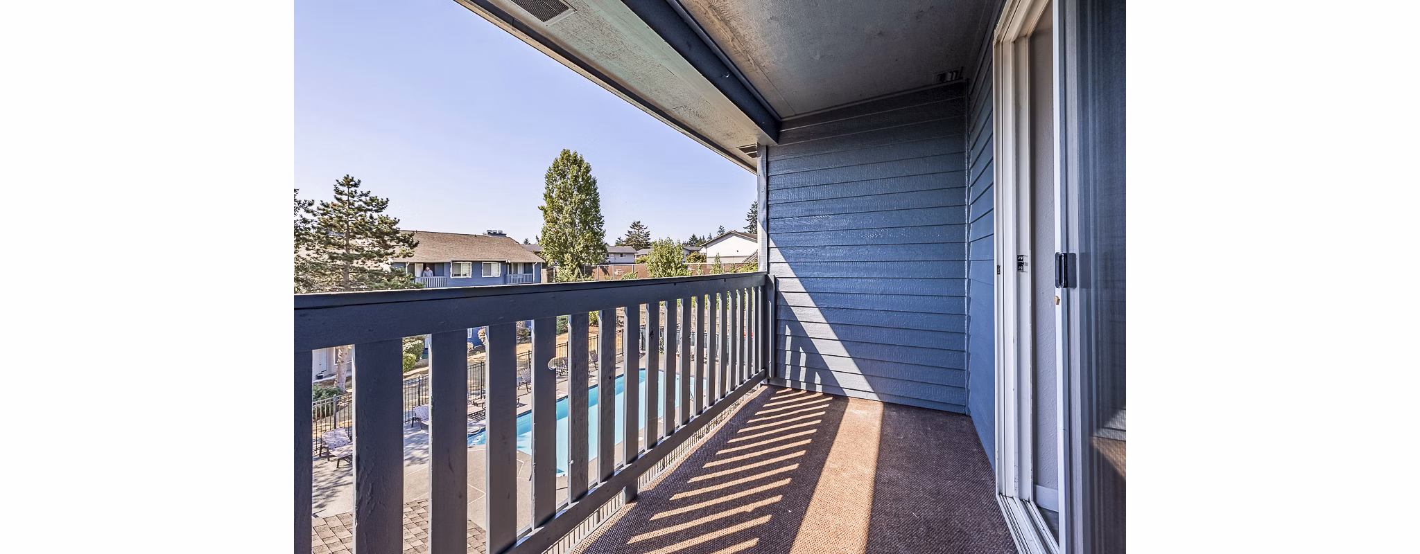 Private patio balcony with city views at 1202 Pearl Apartments