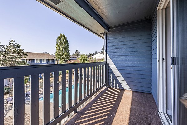 Private patio balcony with city views at 1202 Pearl Apartments