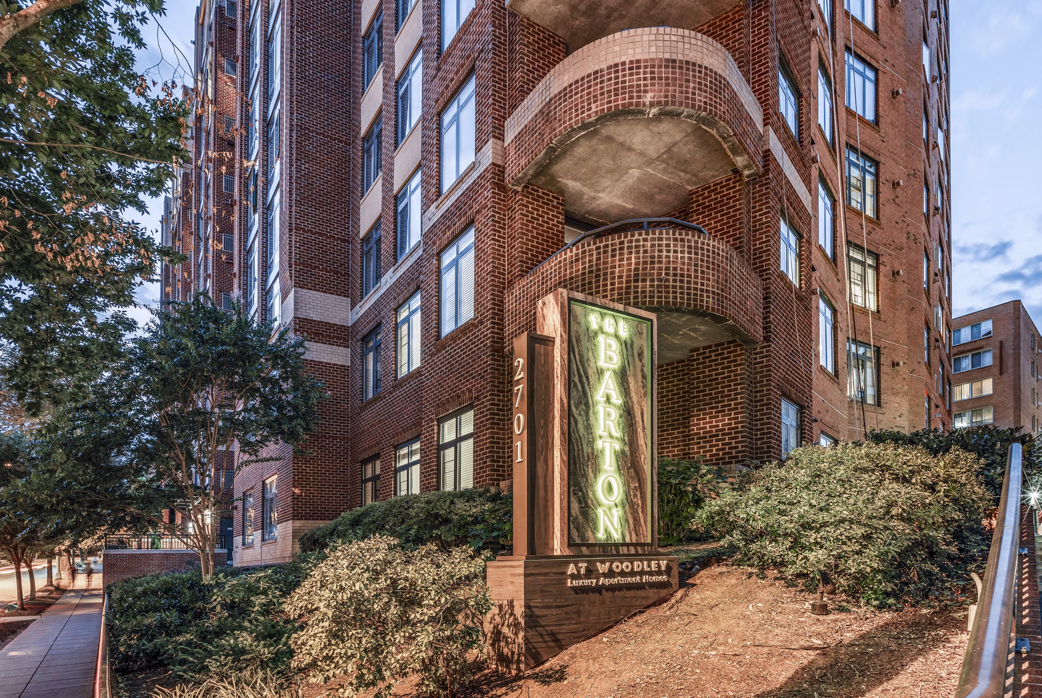 The Barton at Woodley: Luxury apartment building with modern architecture in a serene neighborhood