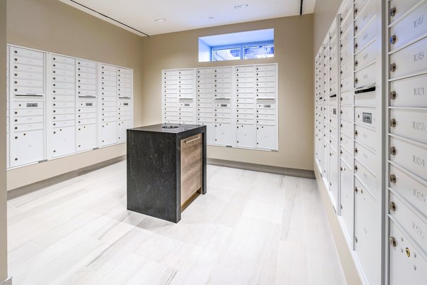 Clubhouse mail room with modern sorting tables at The Barton at Woodley luxury apartments