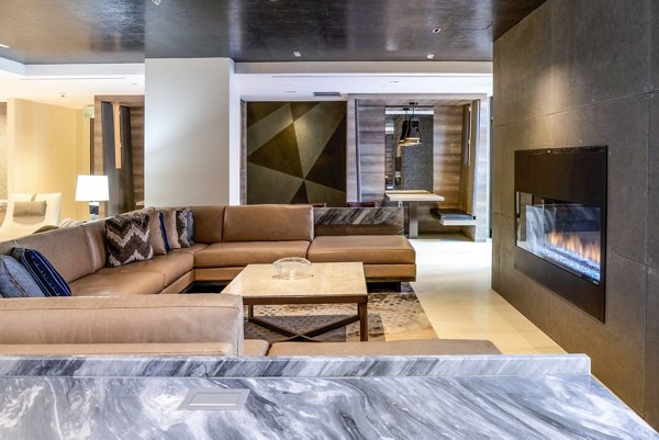 Modern clubhouse with stylish furnishings at The Barton at Woodley Apartments