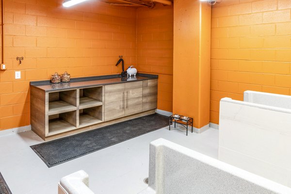 Dog wash station amenity at The Barton at Woodley Apartments, perfect for pet owners seeking convenience and care for their furry friends