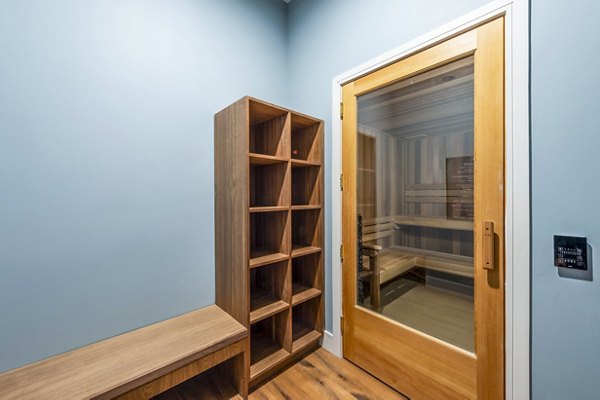 Clubhouse sauna with modern wooden interior at The Waterview Apartments offering relaxation and wellness amenities
