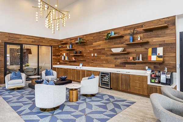 Clubhouse lobby with modern decor at The Waterview Apartments featuring luxury seating and elegant lighting