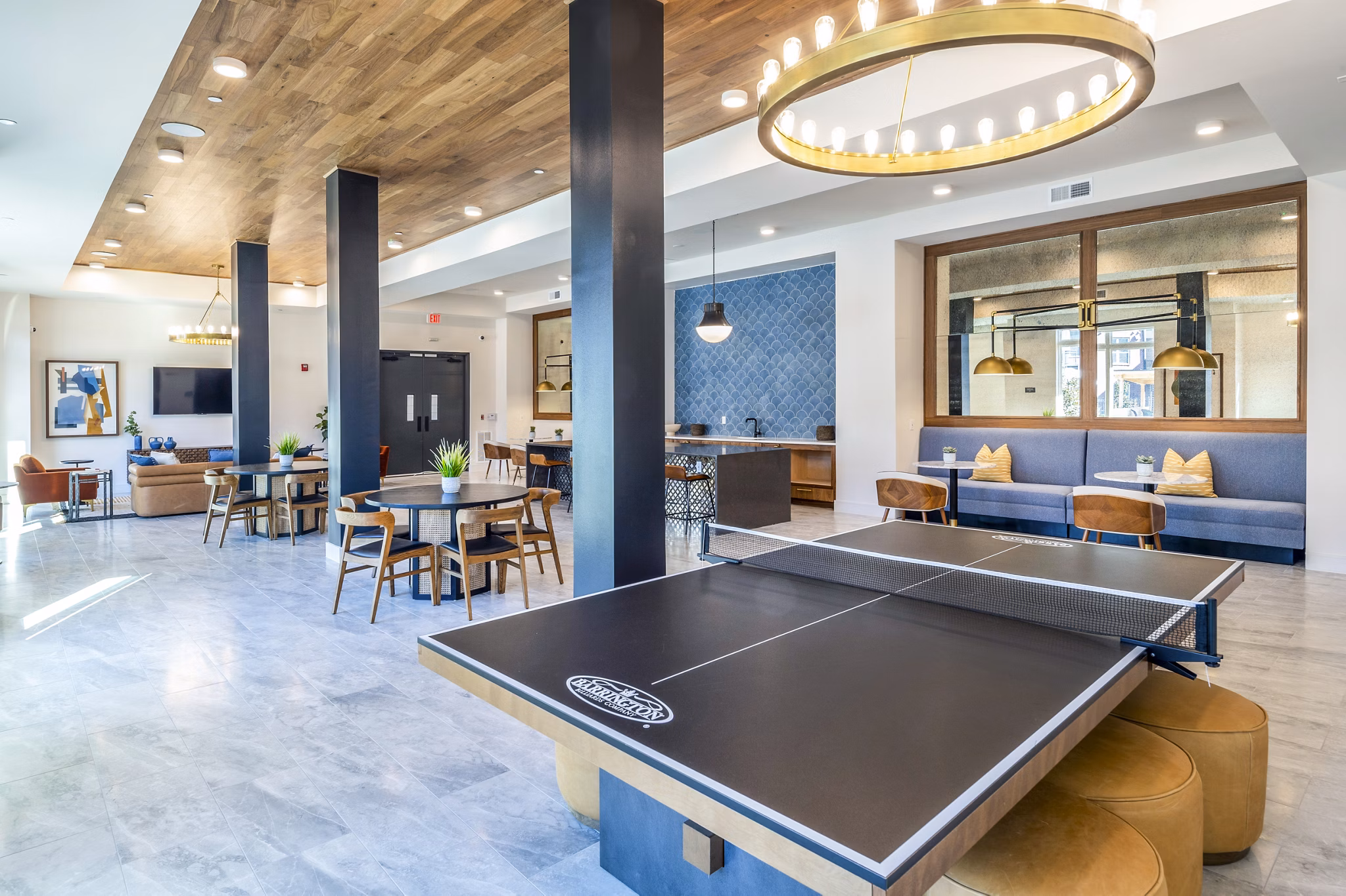 Clubhouse with modern design and cozy seating areas at The Waterview Apartments