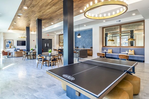 Clubhouse with modern design and cozy seating areas at The Waterview Apartments