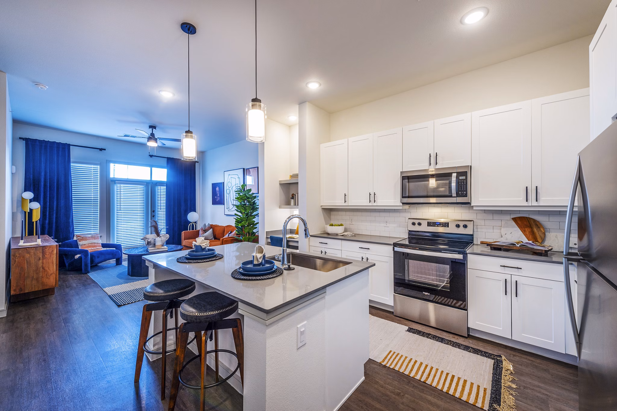 Kitchen featuring modern appliances in The Waterview Apartments, Greystar luxury property with elegant design and premium finishes