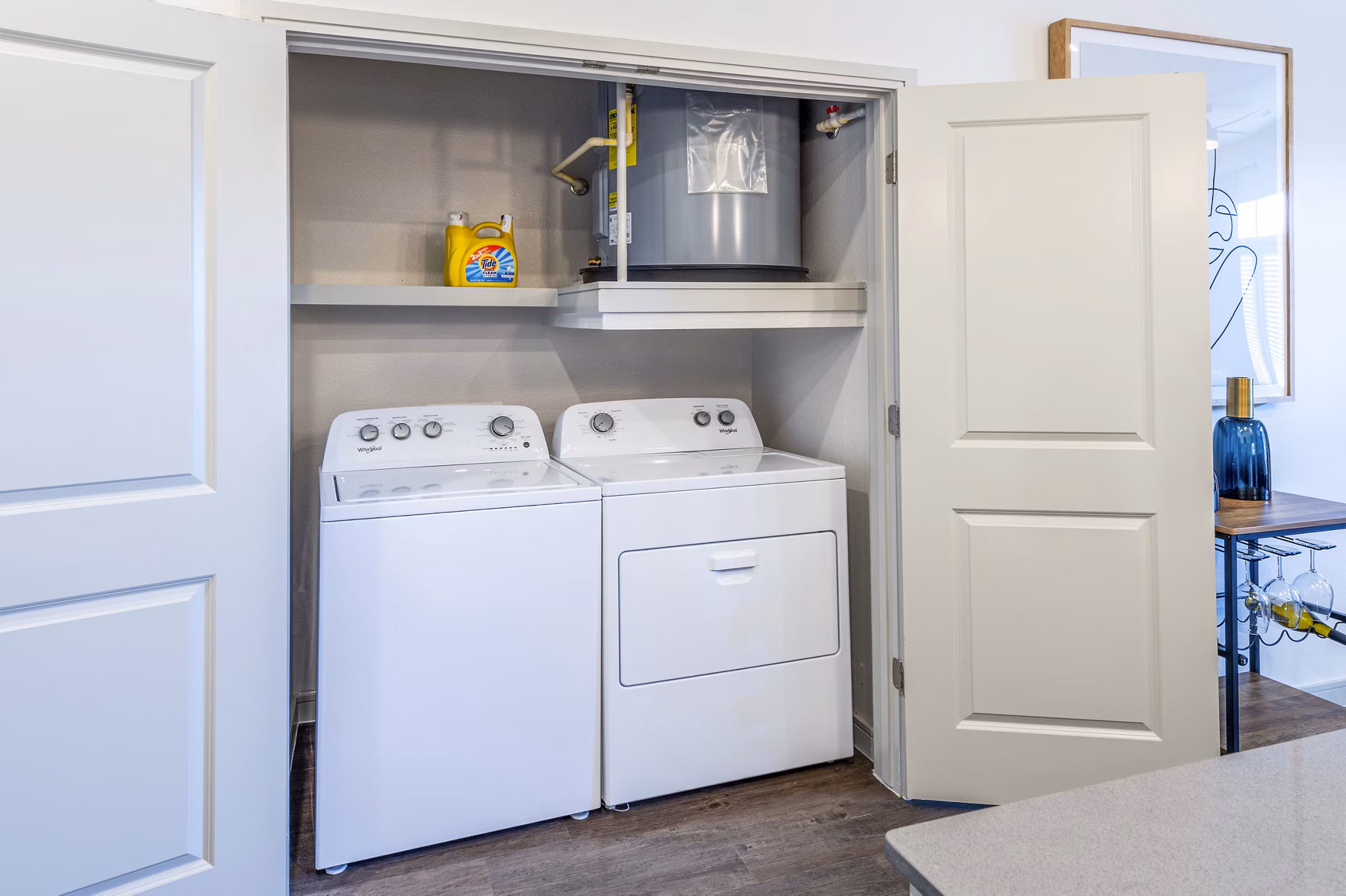 Modern laundry room with front-loading machines at The Waterview Apartments
