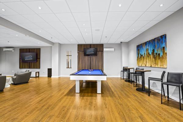 clubhouse game room at Meridia Apartments