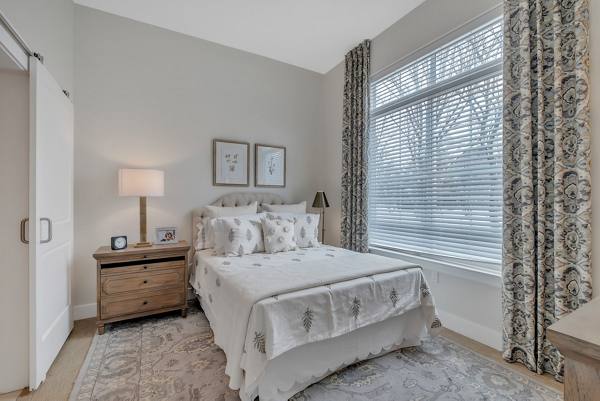 bedroom at Ovation at Riverwalk Apartments