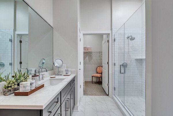 Luxury bathroom featuring modern fixtures in Icon Riverwalk Apartments