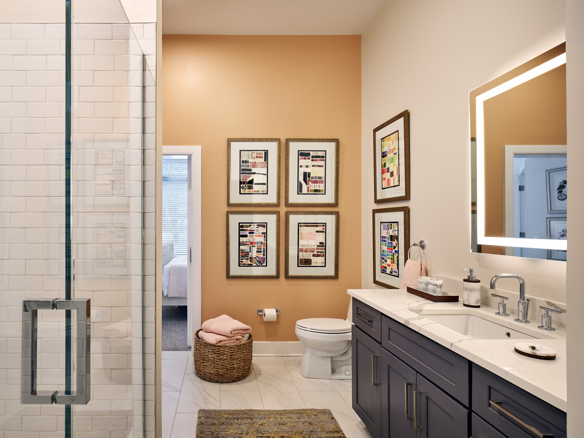 Modern bathroom with sleek fixtures at Icon Riverwalk apartments, luxury living by the waterfront