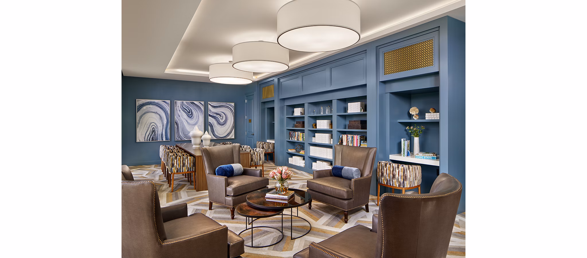 Icon Riverwalk Apartments: Modern clubhouse with multi-purpose spaces and stylish decor