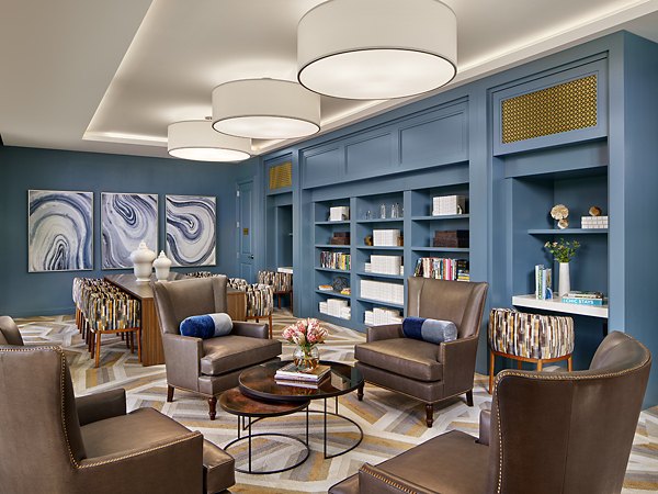 Icon Riverwalk Apartments: Modern clubhouse with multi-purpose spaces and stylish decor