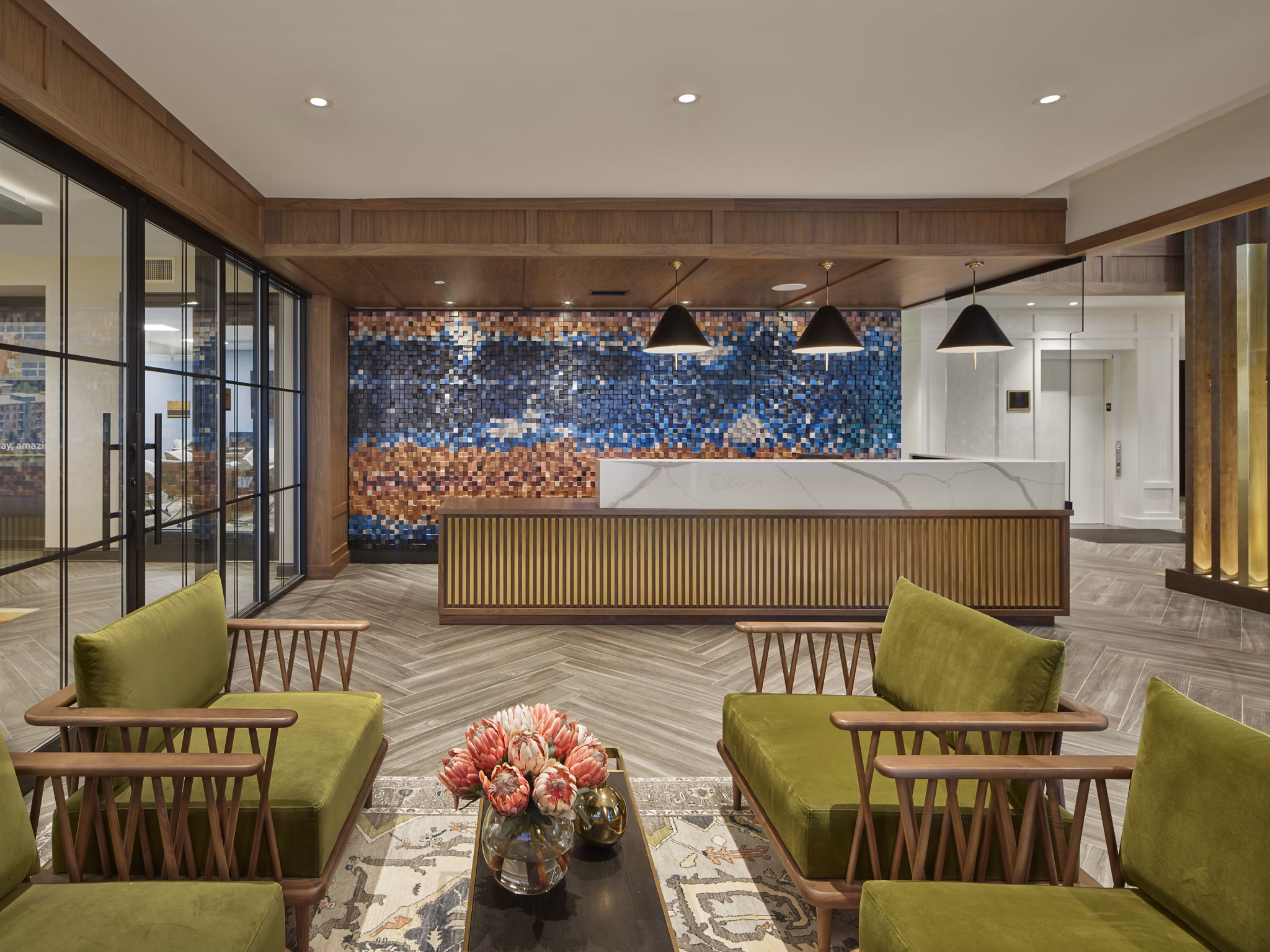 Clubhouse featuring modern decor and social spaces at Icon Riverwalk Apartments