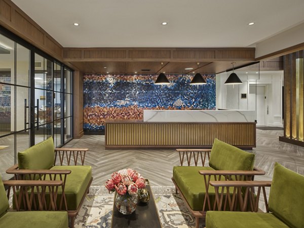 Clubhouse featuring modern decor and social spaces at Icon Riverwalk Apartments