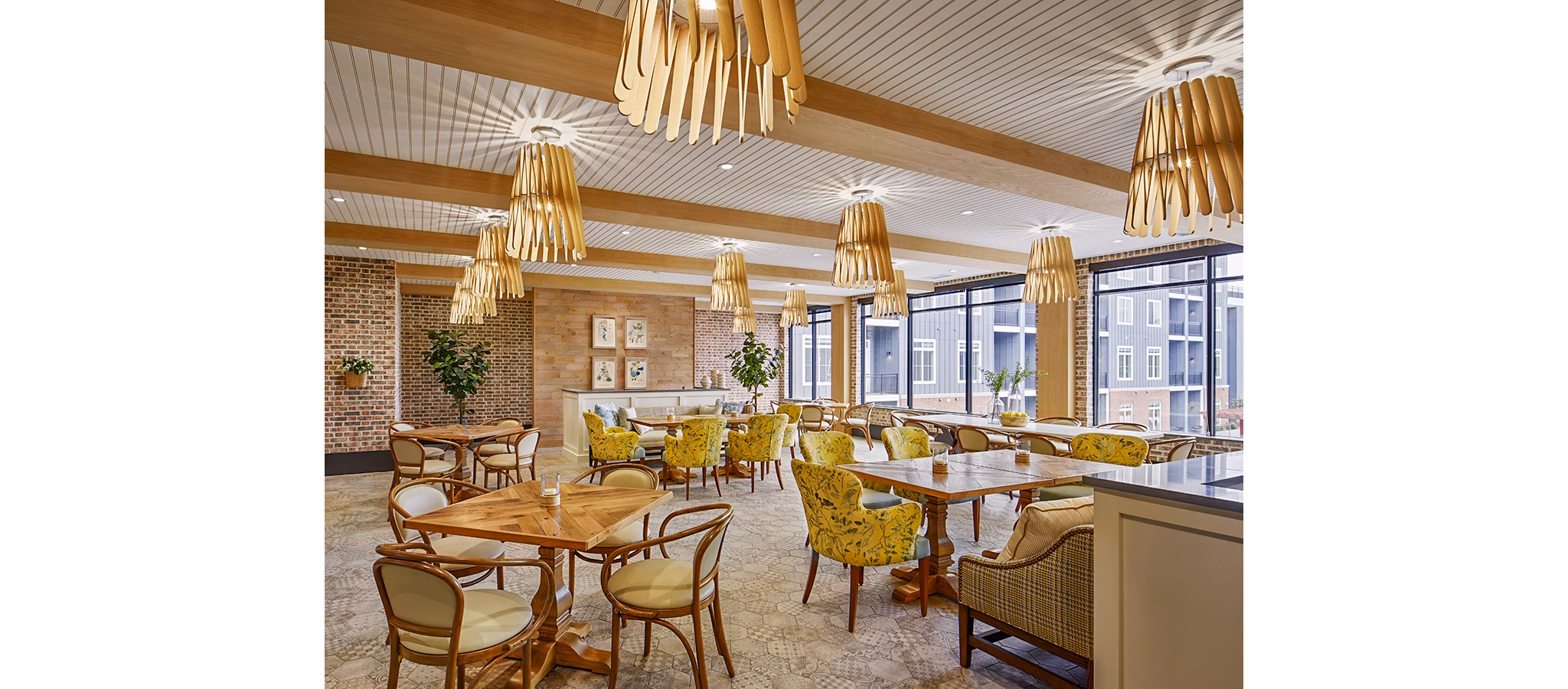 Elegant dining room with contemporary decor in Icon Riverwalk Apartments clubhouse