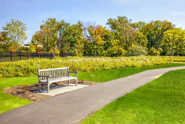 Recreational area with walking trail at Icon Riverwalk Apartments