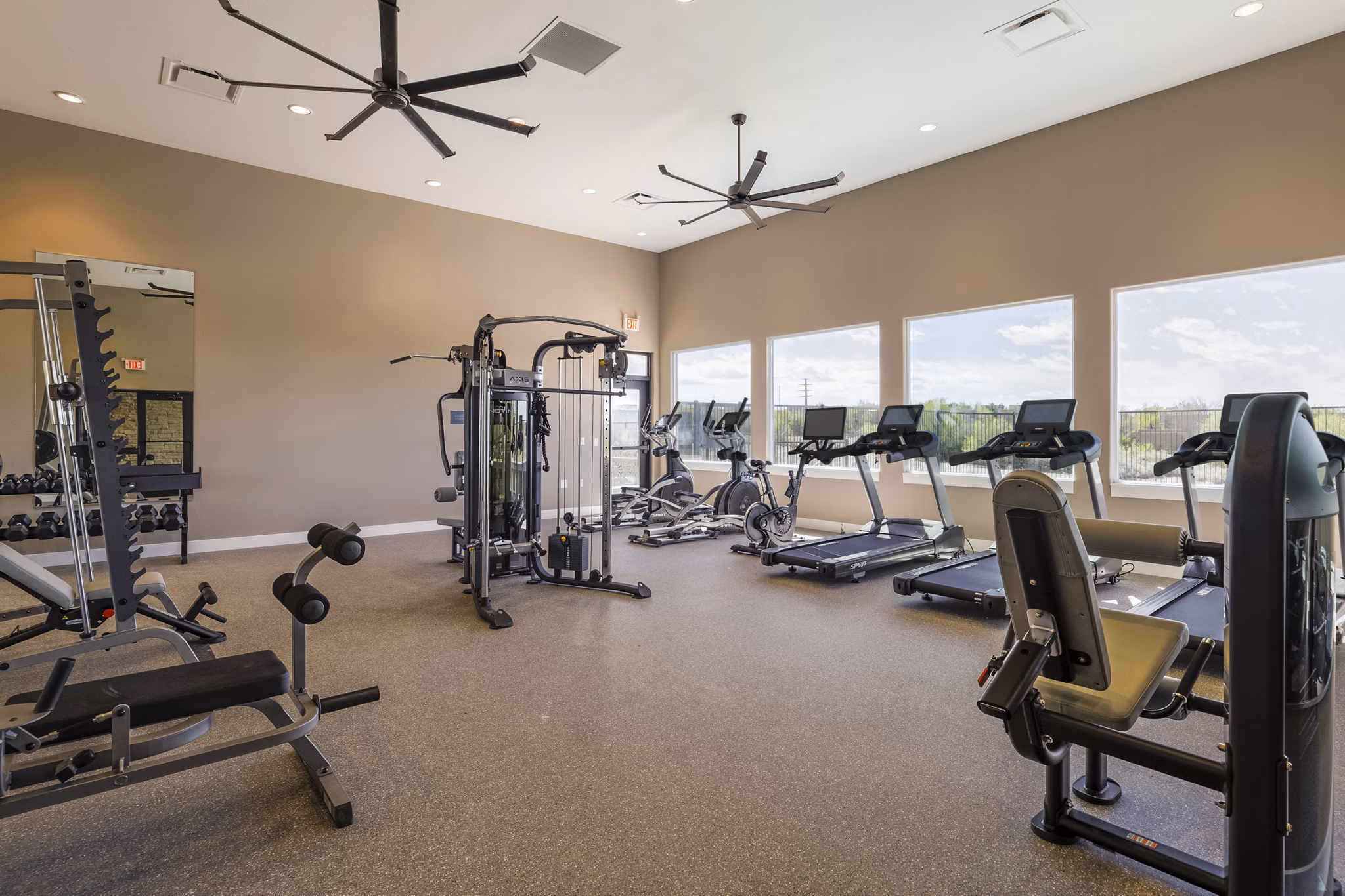 fitness center at Turquesa Apartments