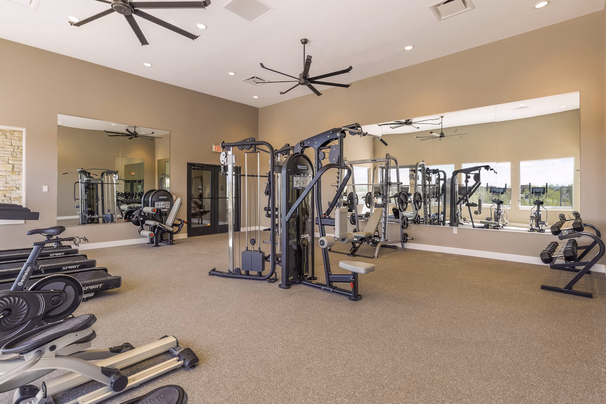 fitness center at Turquesa Apartments