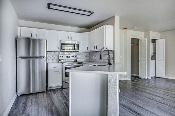 kitchen at River Oaks Apartment & Suites Apartments