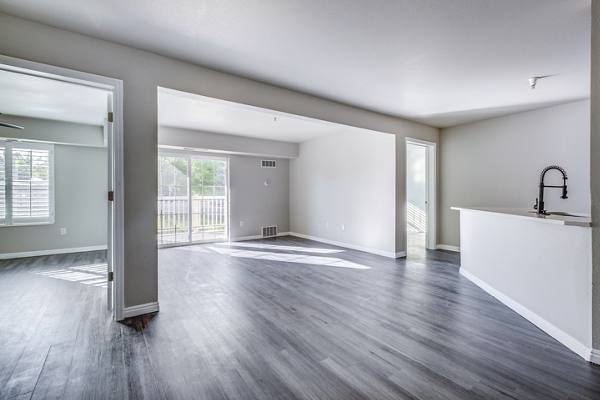 living room at River Oaks Apartment & Suites Apartments