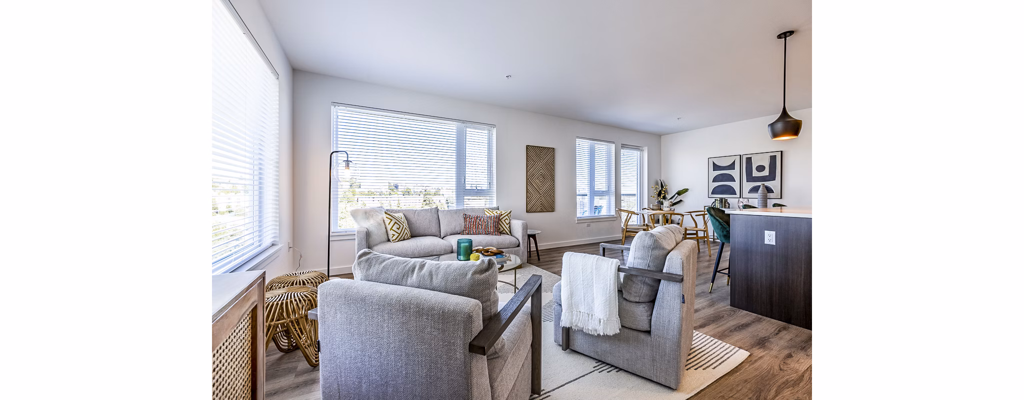 Modern living room with stylish furnishings at Mason & Main Apartments, showcasing luxury living in an urban setting