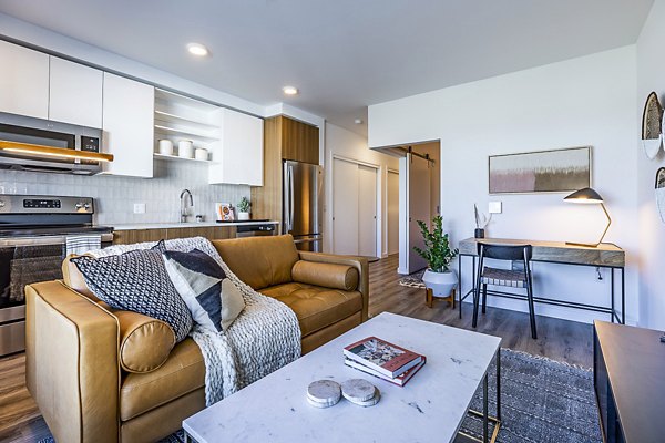 Spacious living room with contemporary design at Mason & Main Apartments