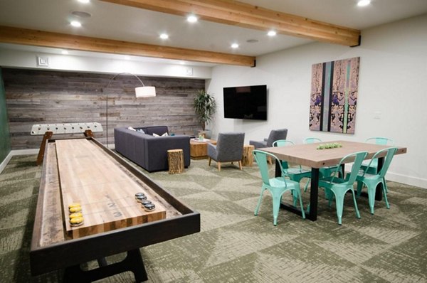 Elegant clubhouse with comfy seating areas at The Fairways Apartments, ideal for social gatherings and community events