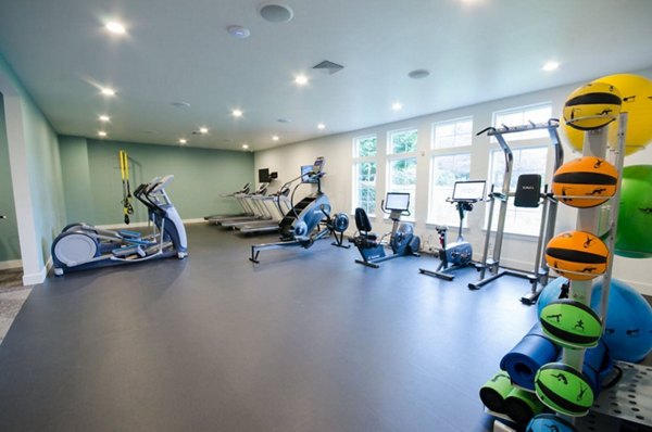 Modern fitness center with state-of-the-art equipment at The Fairways Apartments