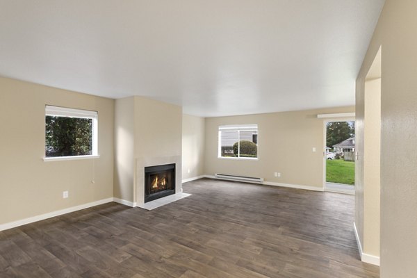 Spacious living room with modern decor at The Fairways Apartments