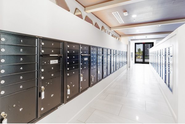 Modern mail room featuring secure parcel lockers at The Core Natomas Apartments