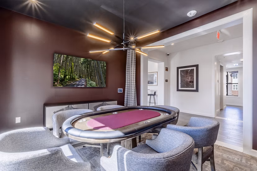 Clubhouse with modern design and cozy seating at The Core Natomas Apartments in Sacramento