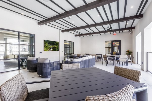 Outdoor patio with modern seating at The Core Natomas Apartments