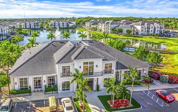 Modern clubhouse featuring stylish seating and a social lounge at Estero Oaks Apartments