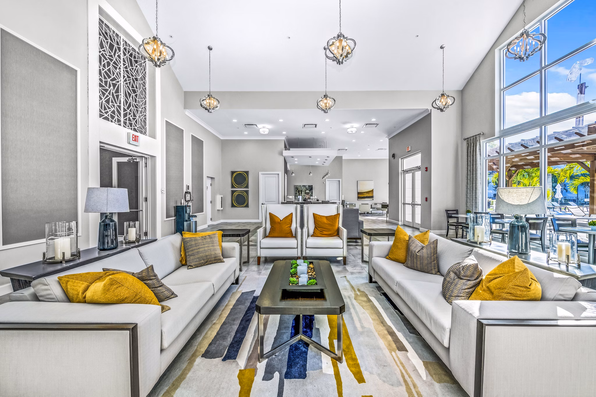 Stylish clubhouse with modern seating and decor at Estero Oaks Apartments