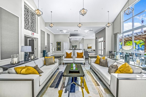 Stylish clubhouse with modern seating and decor at Estero Oaks Apartments