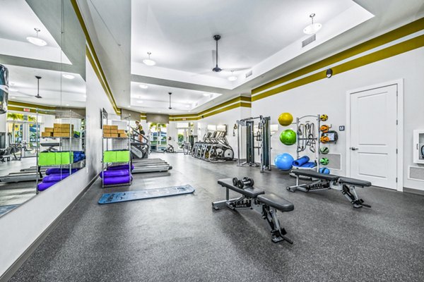 Modern fitness center with advanced equipment at Estero Oaks Apartments, ideal for active lifestyles