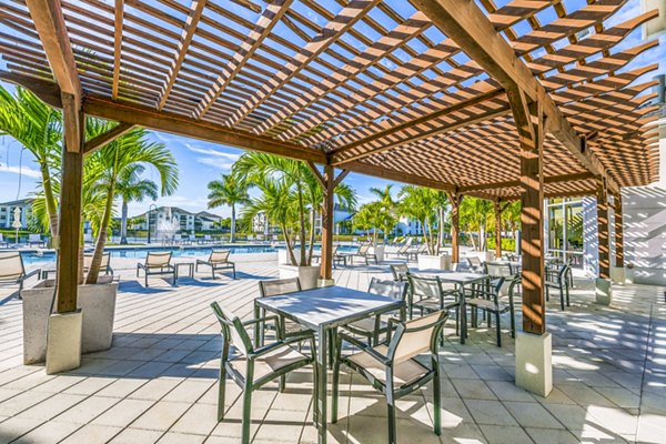 Patio with stylish outdoor furniture at Estero Oaks Apartments, perfect for relaxation and entertainment in a luxury setting