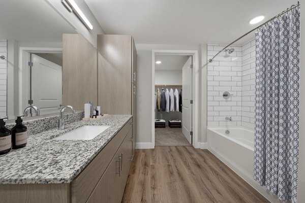 Modern bathroom with sleek fixtures at Album Marana Apartments offering luxury living by Greystar