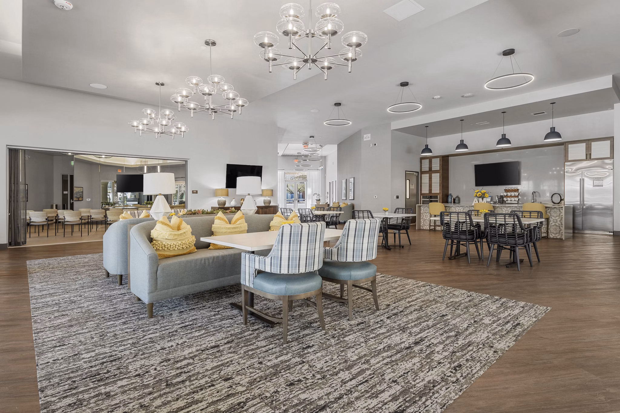 Chic clubhouse with modern furnishings at Album Marana Apartments, perfect for social gatherings and community events