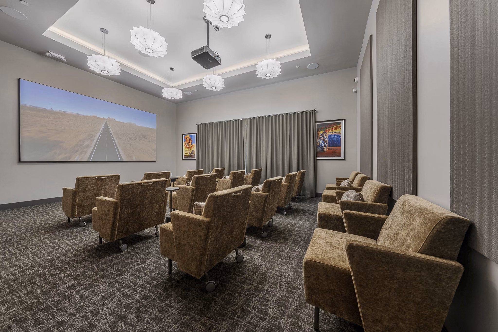 Stylish clubhouse with modern seating and lighting at Album Marana Apartments in Greystar luxury community