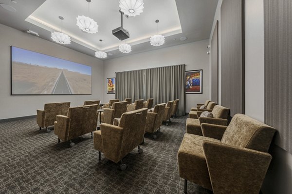 Stylish clubhouse with modern seating and lighting at Album Marana Apartments in Greystar luxury community