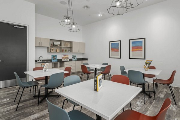 Modern clubhouse with cozy seating areas at Album Marana Apartments, luxury living by Greystar