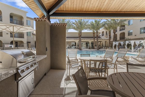 Album Marana Apartments: Outdoor grill area with modern setups for social gatherings