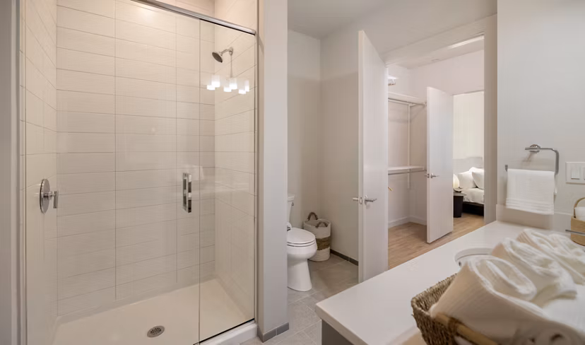 Elegant bathroom with modern fixtures at Darien Commons Apartments, showcasing luxury living in a premium Greystar community