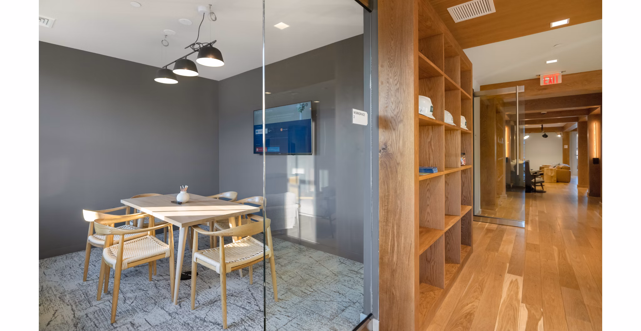 Modern clubhouse with cozy seating areas at Darien Commons Apartments, offering luxury living and community events in a stylish setting