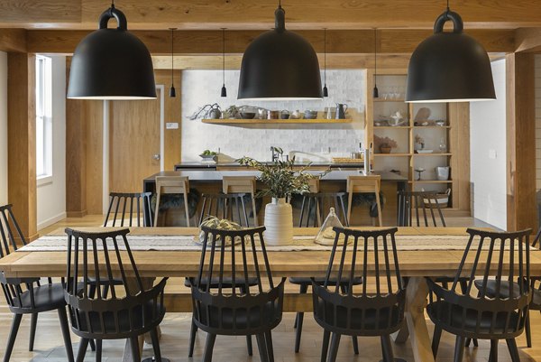 Modern dining room with elegant lighting at Darien Commons Apartments