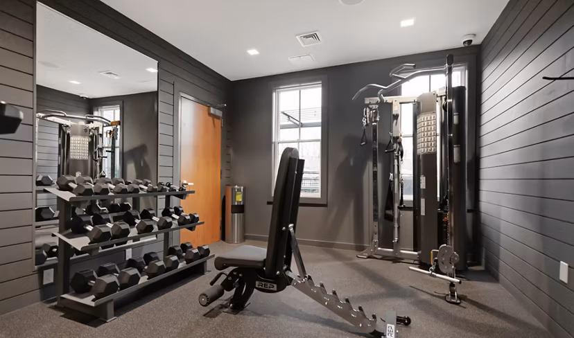 State-of-the-art fitness center with modern equipment at Darien Commons Apartments